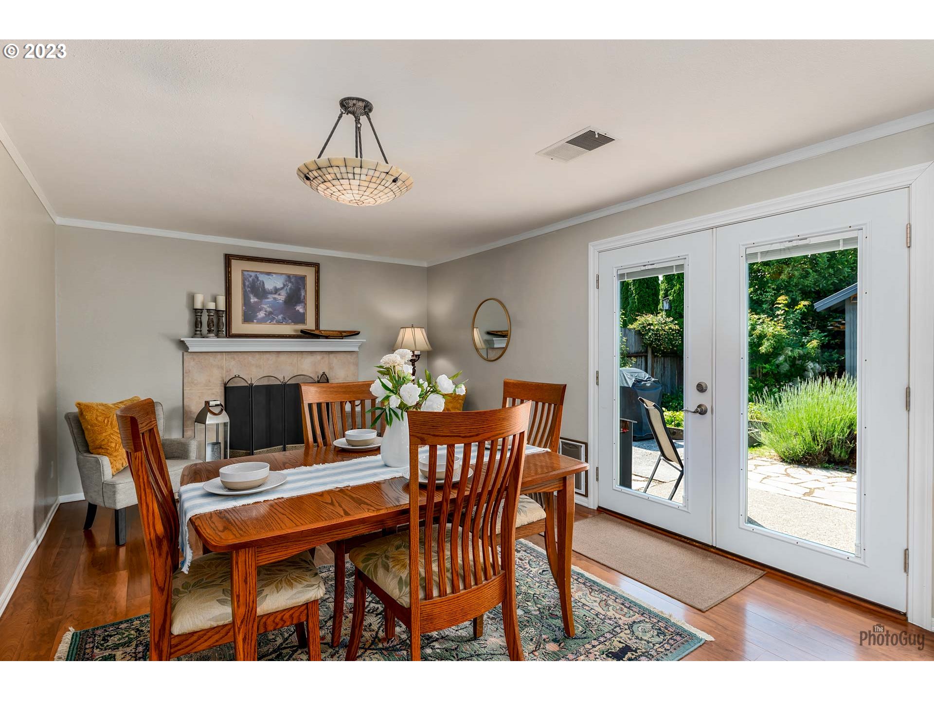 5621 C Street Springfield, OR 97478 - Photo 13 of 29 a view of a dining room with furniture window and wooden floor