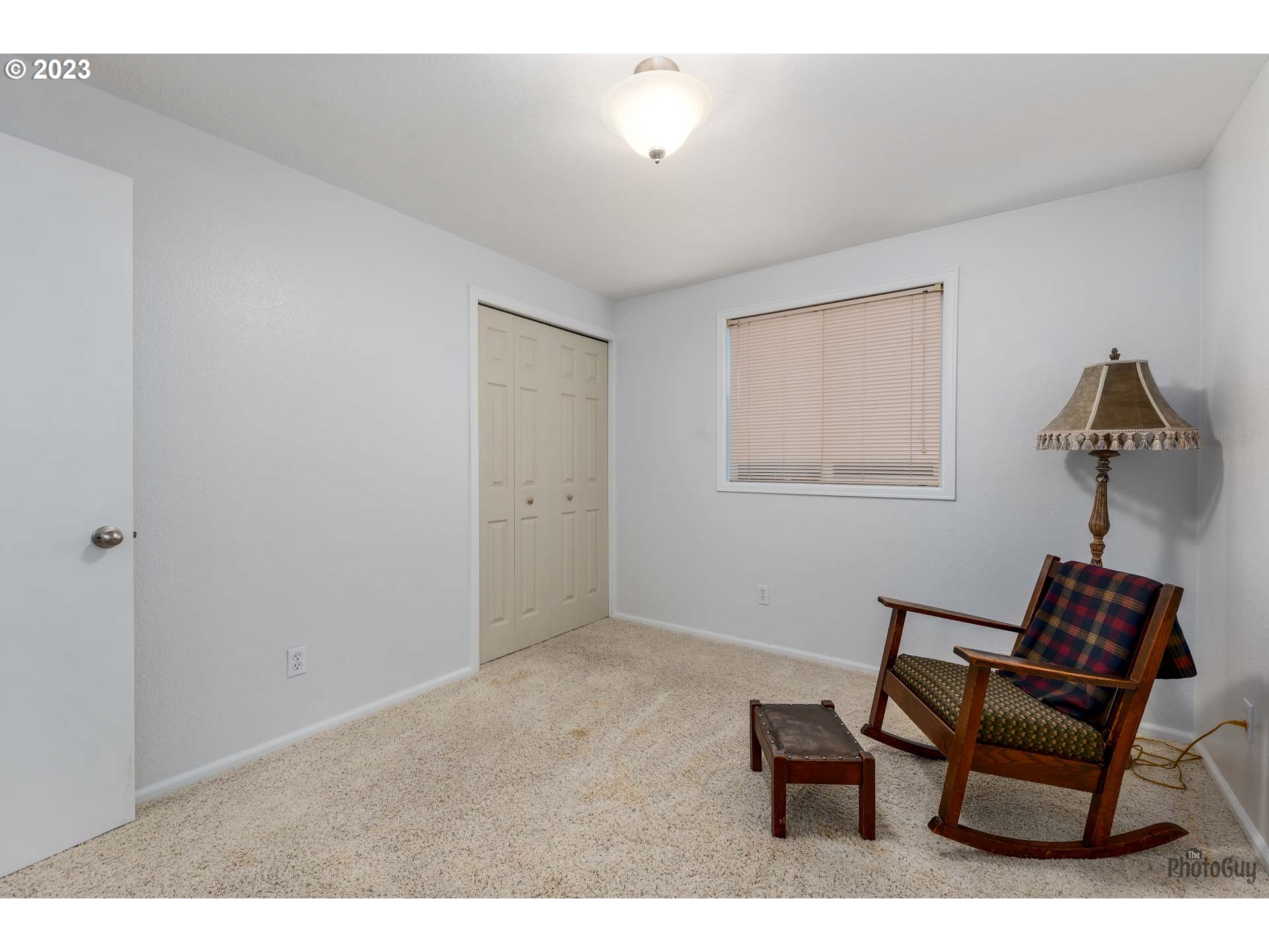5621 C Street Springfield, OR 97478 - Photo 18 of 29 a bedroom with furniture and a window