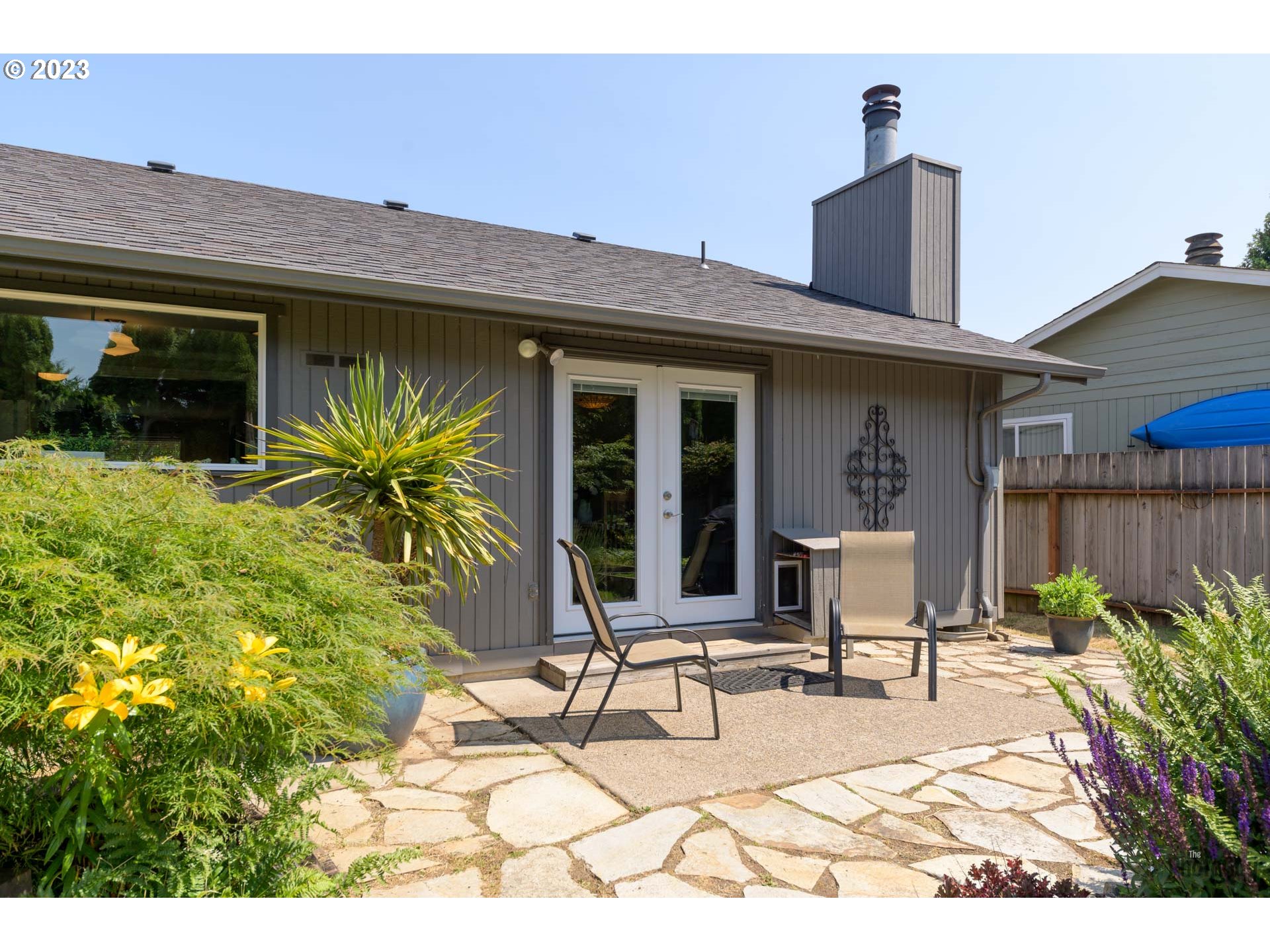 5621 C Street Springfield, OR 97478 - Photo 29 of 29 a view of a house with backyard and sitting area