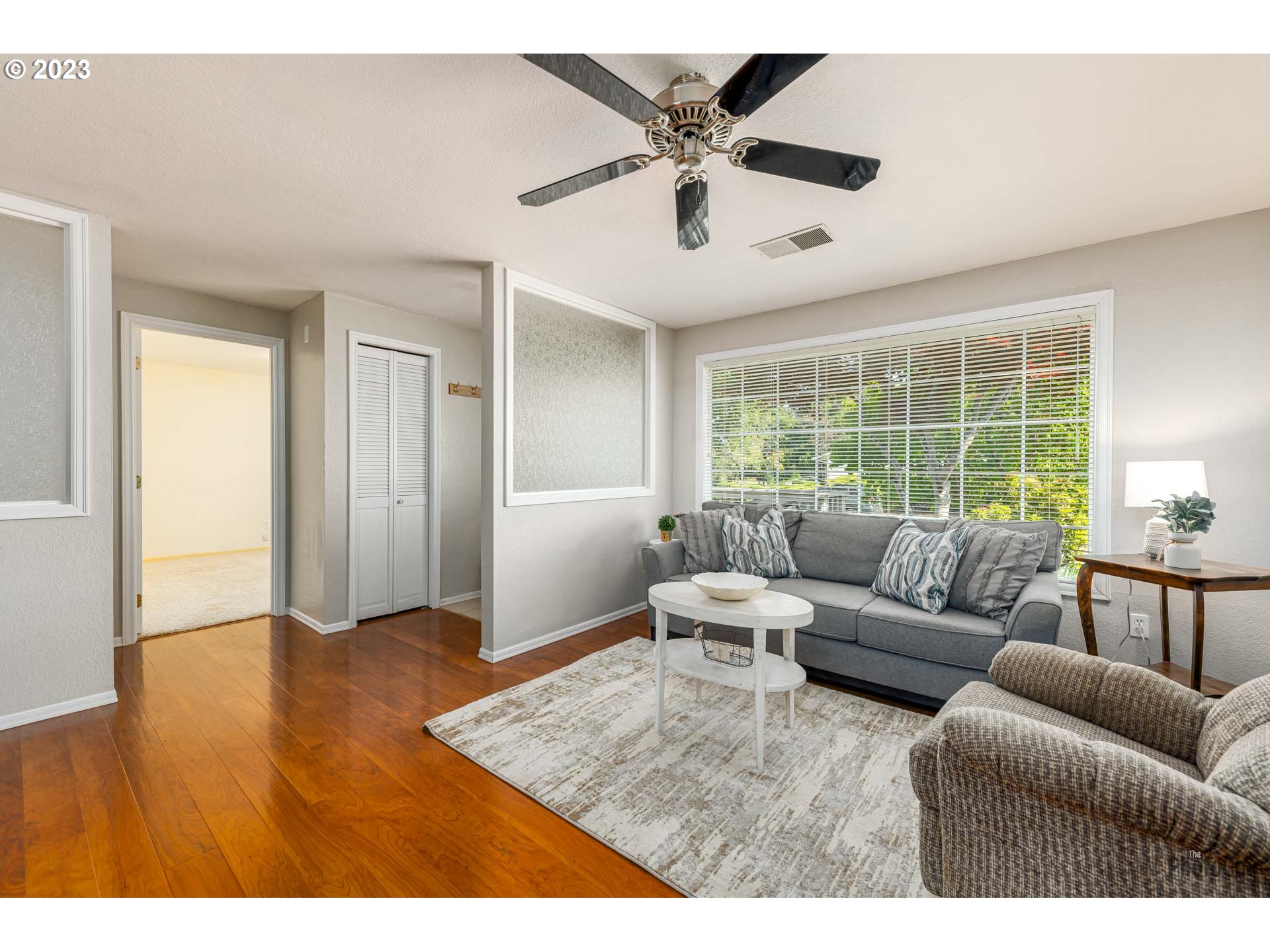 5621 C Street Springfield, OR 97478 - Photo 6 of 29 a living room with furniture and a large window