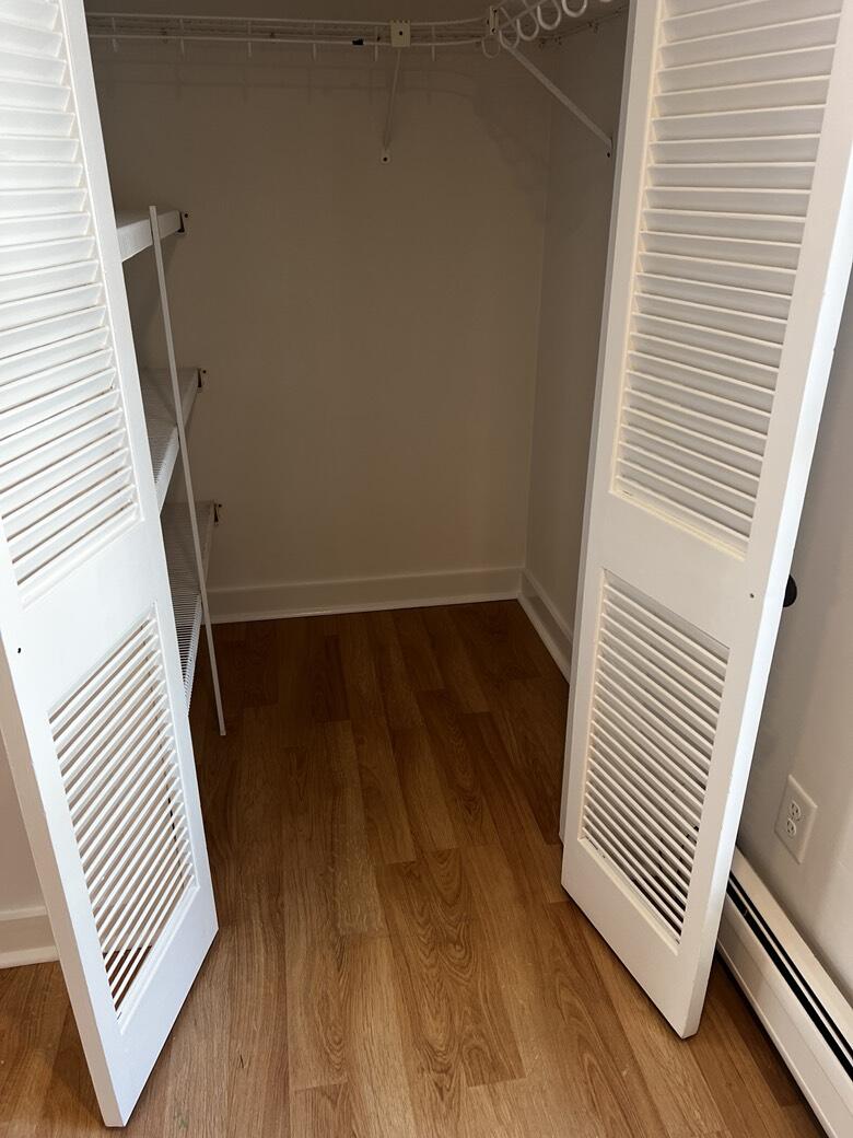 237 Route 28, Unit 3 Harwich, MA 02671 - Photo 5 of 7 a view of a hardwood floor and staircase
