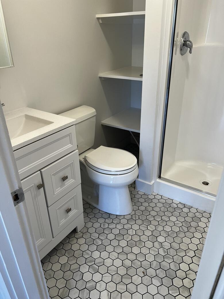 237 Route 28, Unit 3 Harwich, MA 02671 - Photo 6 of 7 a bathroom with a toilet and a shower
