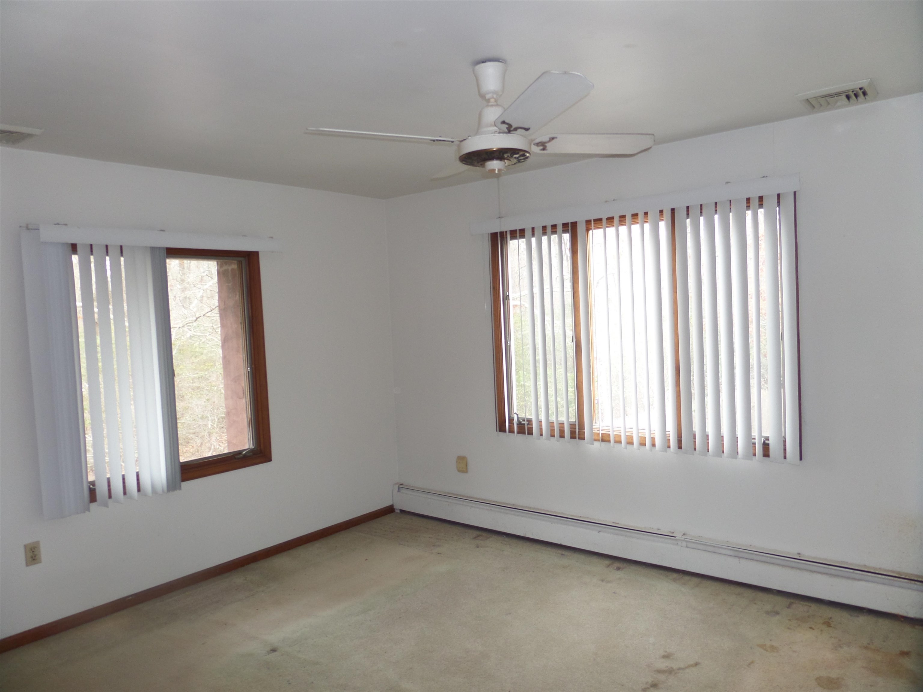78 Tyler Road Ocean View, NJ 08230 - Photo 13 of 22 an empty room with a window