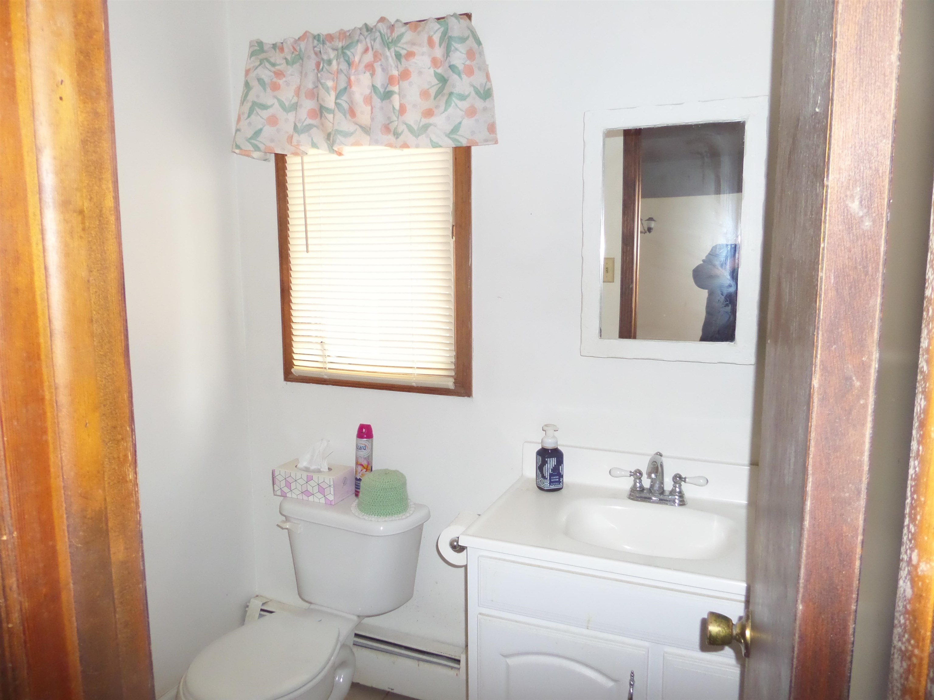 78 Tyler Road Ocean View, NJ 08230 - Photo 13 of 22 a bathroom with a toilet sink and mirror
