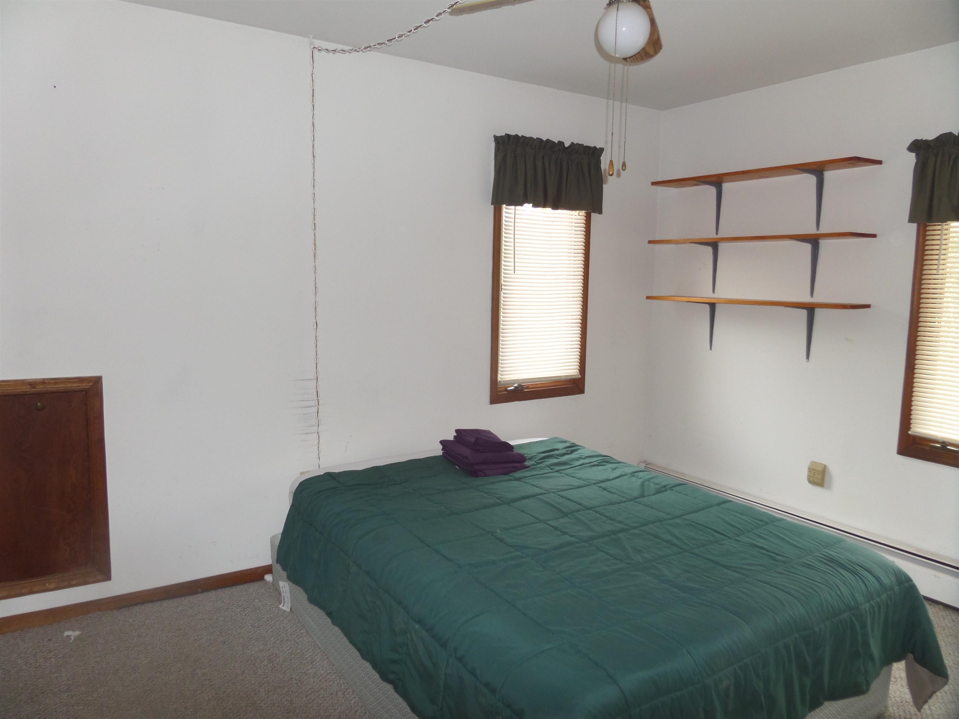 78 Tyler Road Ocean View, NJ 08230 - Photo 16 of 22 a bedroom with a bed and window