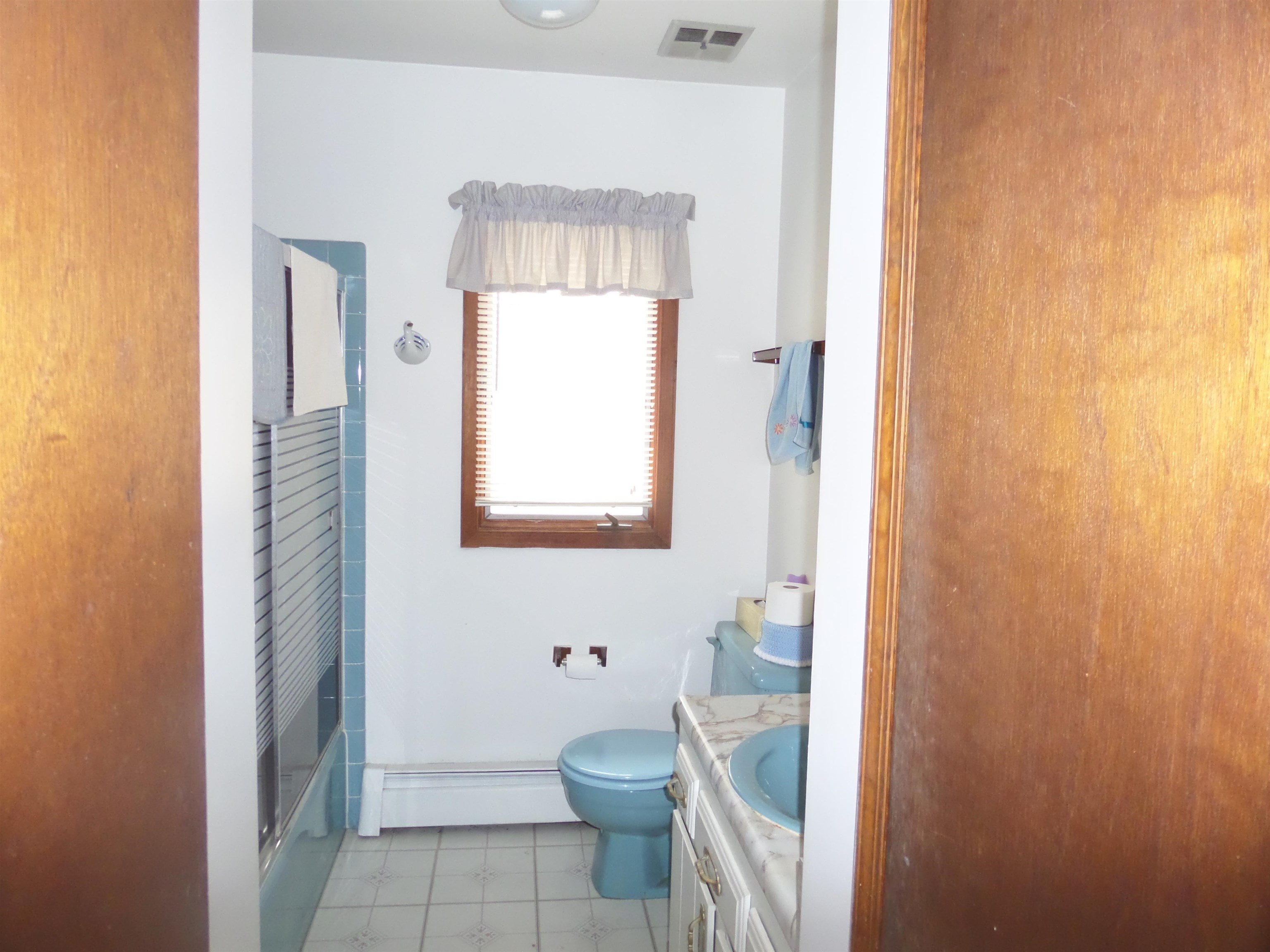 78 Tyler Road Ocean View, NJ 08230 - Photo 21 of 22 a bathroom with a toilet sink and mirror