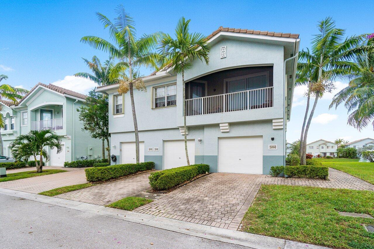 3266 Laurel Ridge Circle Riviera Beach, FL 33404 - Photo 2 of 34 Front