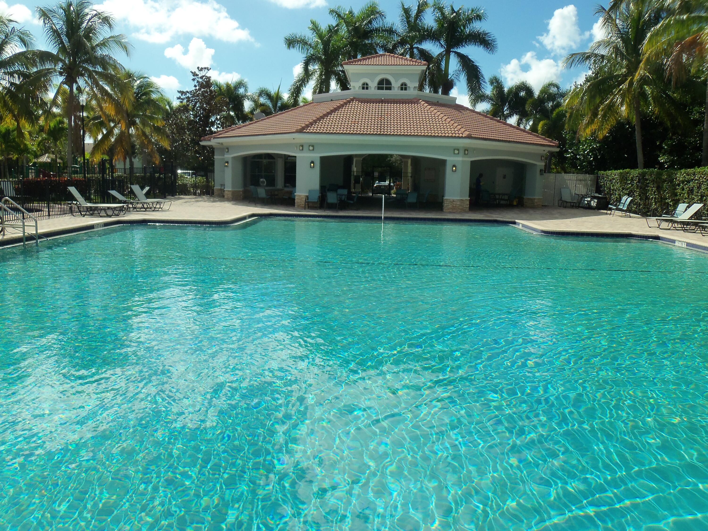 3266 Laurel Ridge Circle Riviera Beach, FL 33404 - Photo 26 of 34 Heated resort pool