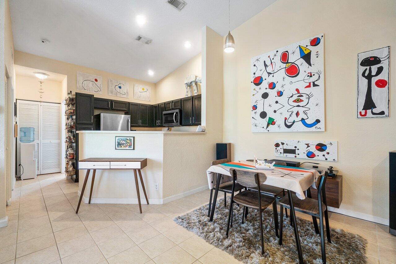 3266 Laurel Ridge Circle Riviera Beach, FL 33404 - Photo 6 of 34 Dining room/kitchen