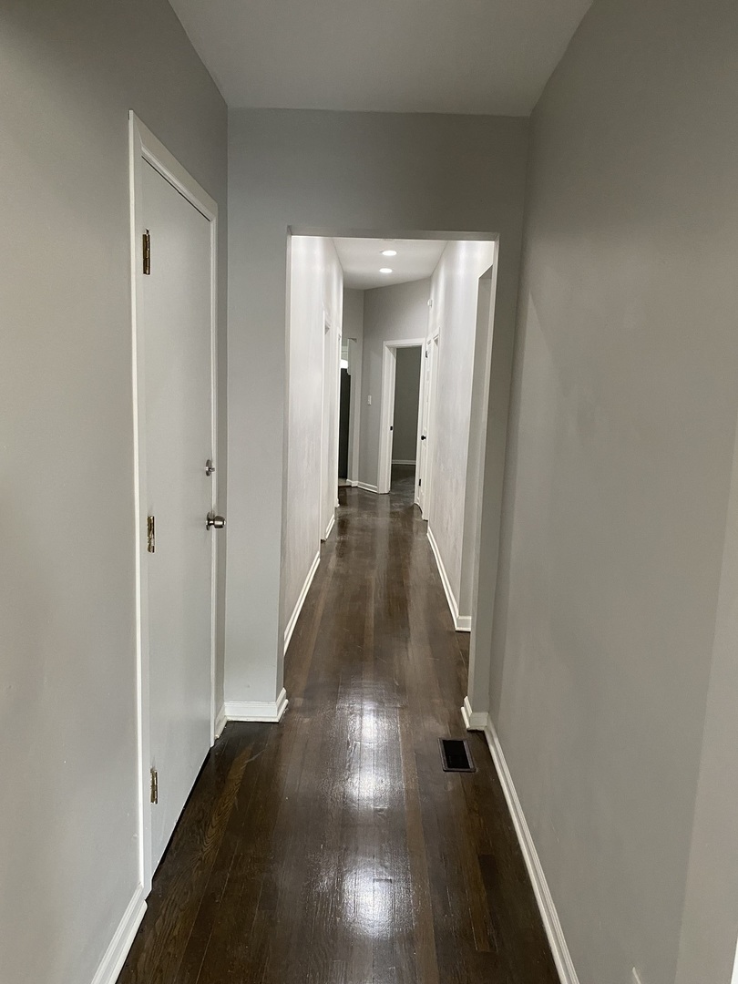 7425 South Princeton Avenue, Unit 1 Chicago, IL 60621 - Photo 4 of 24 a view of hallway with stairs