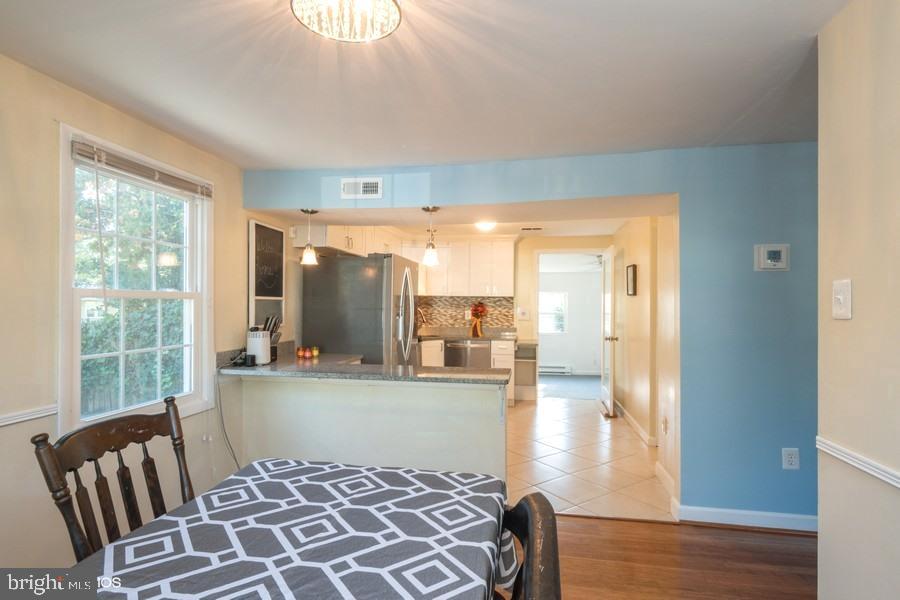 1340 Tenbrook Road Odenton, MD 21113 - Photo 11 of 27 Dining, kitchen, and sunroom