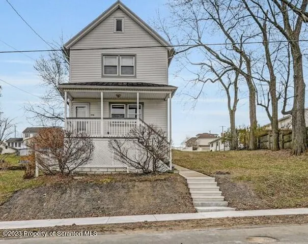 a house view with a outdoor space