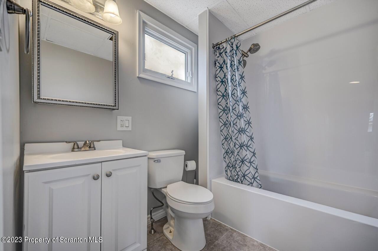 2725 Cedar Avenue Scranton, PA 18505 - Photo 16 of 29 a bathroom with a sink a toilet and shower