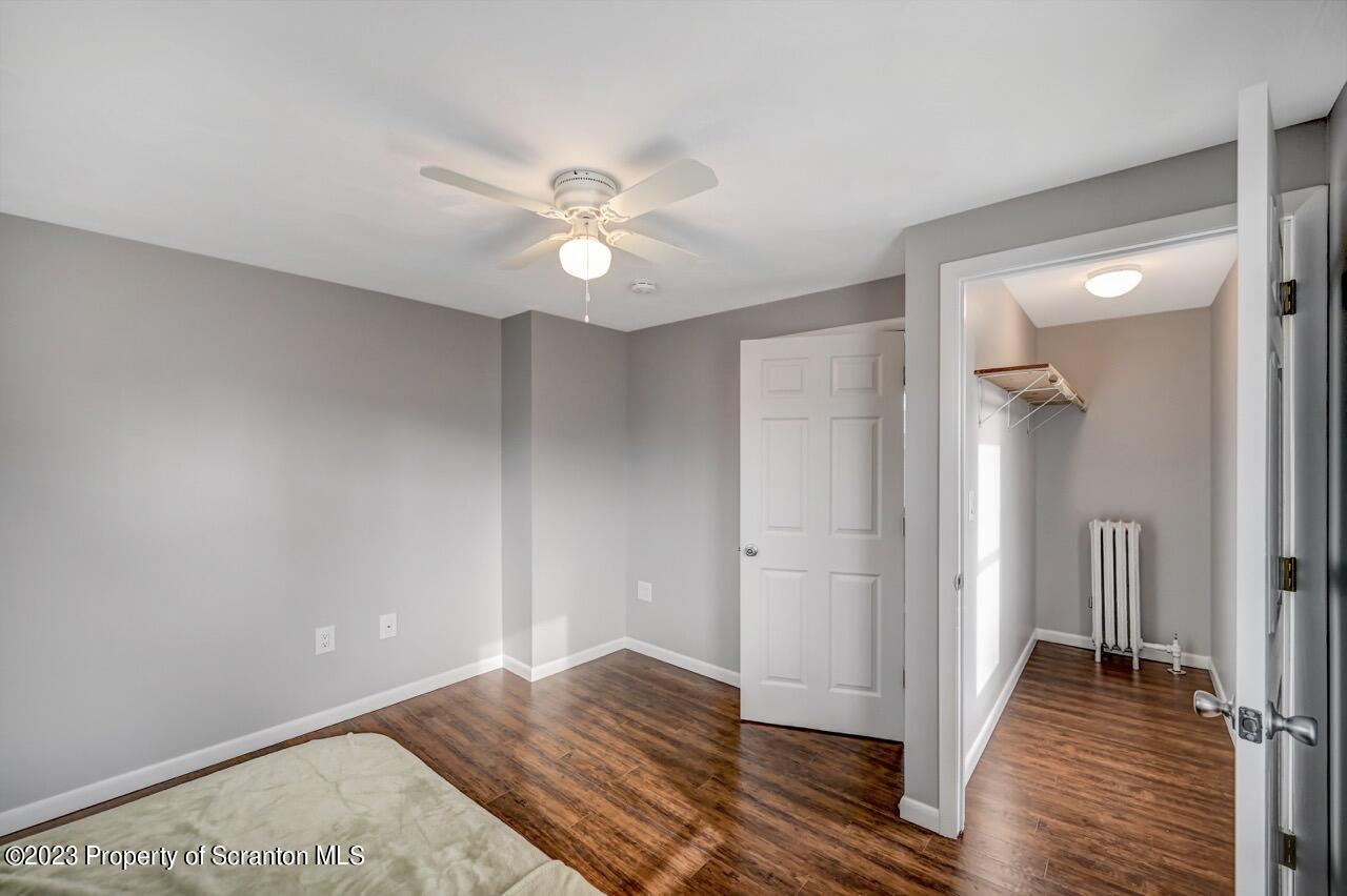 2725 Cedar Avenue Scranton, PA 18505 - Photo 25 of 29 wooden floor in an empty room with a window