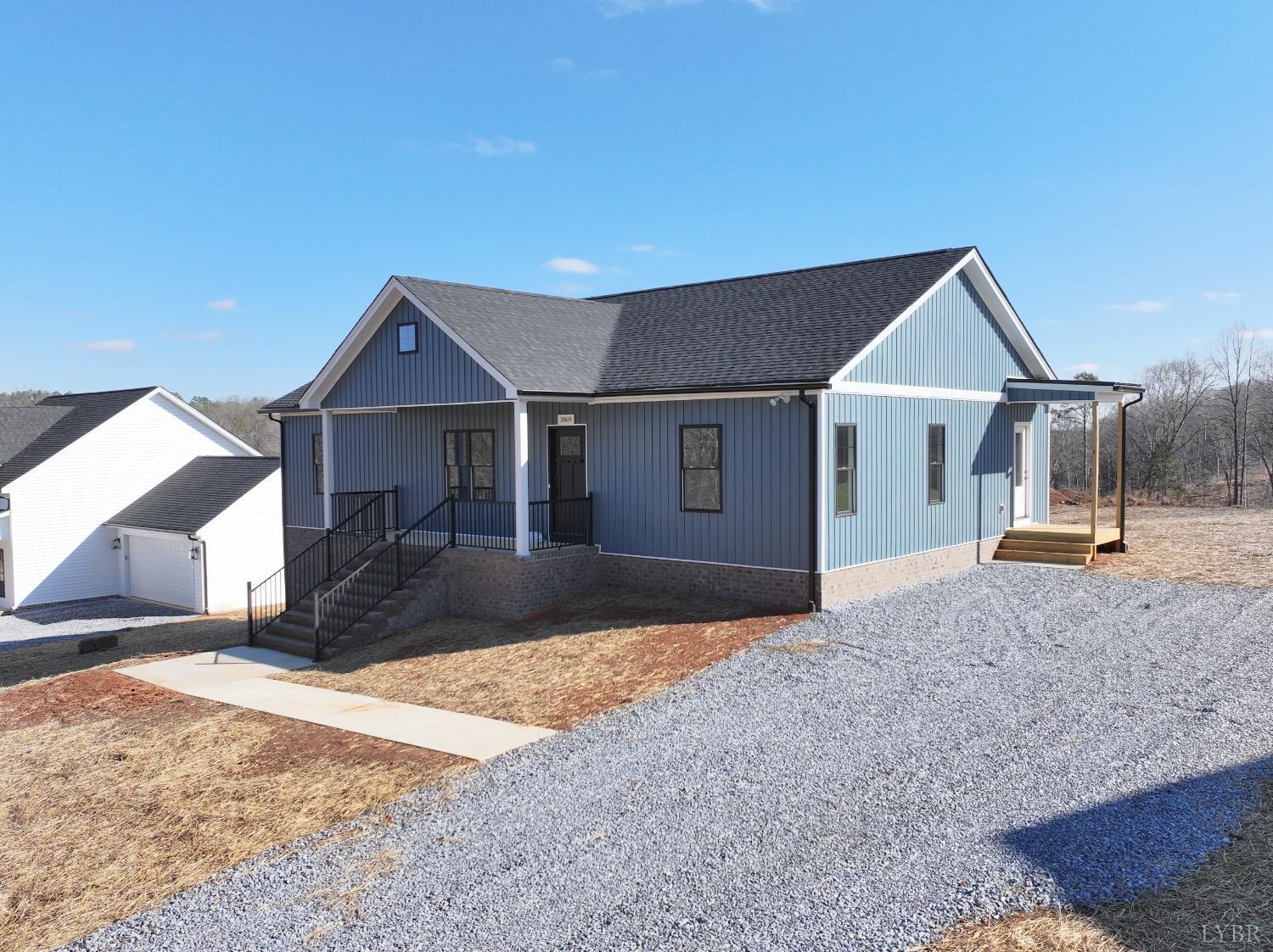 1868 Skinnell Mill Road Bedford, VA 24523 - Photo 16 of 24 a house view with a garden space