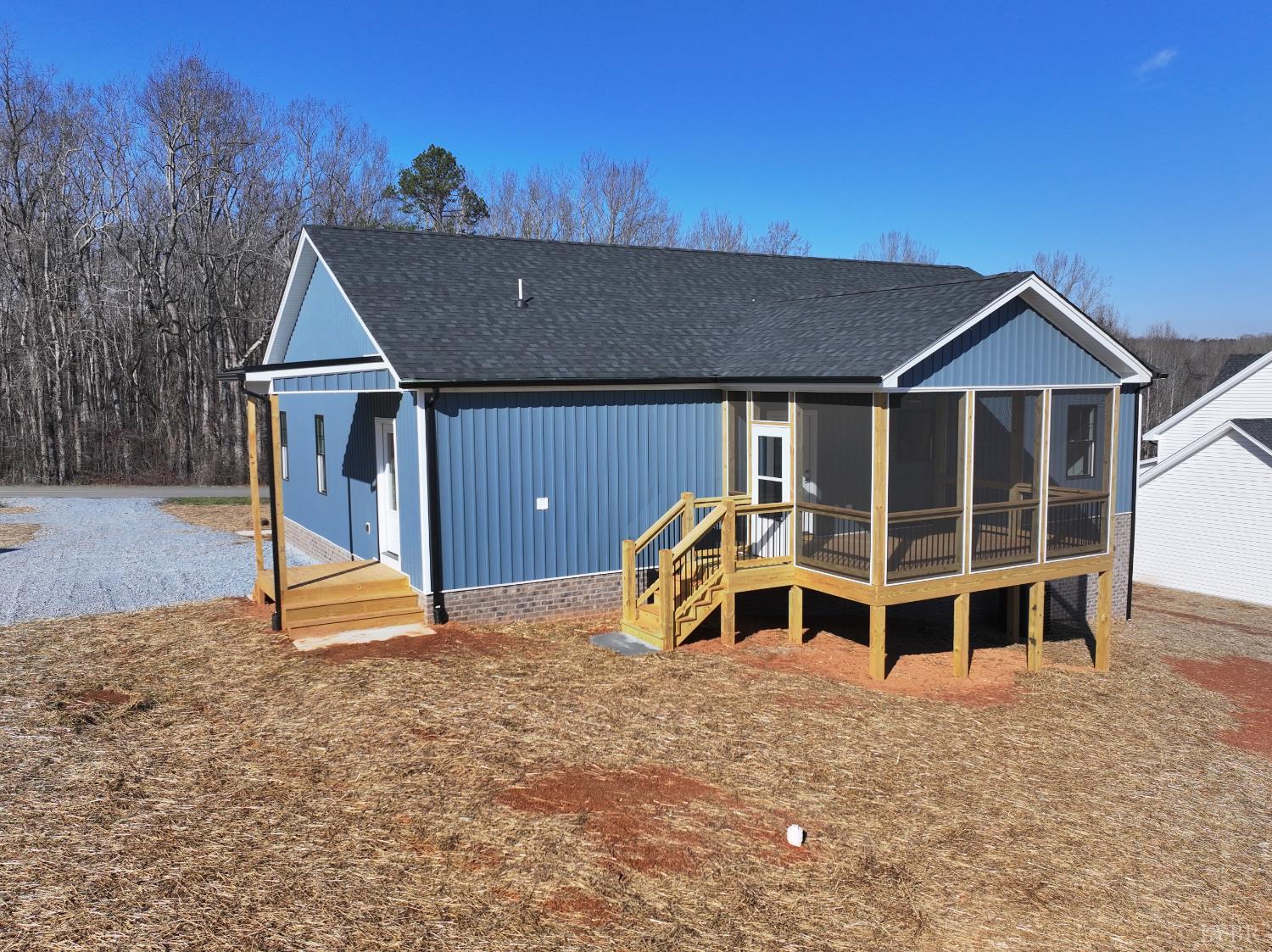 1868 Skinnell Mill Road Bedford, VA 24523 - Photo 18 of 24 a house with trees in the background