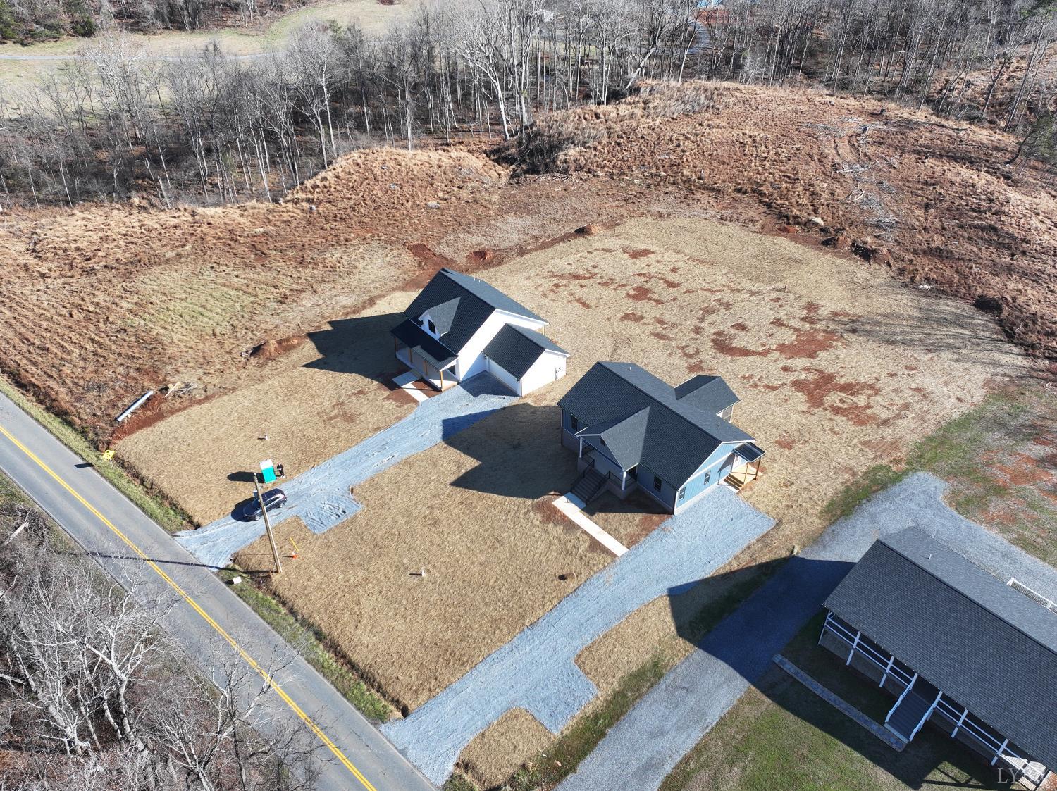 1868 Skinnell Mill Road Bedford, VA 24523 - Photo 22 of 24 a view of roof with wooden deck and seating space