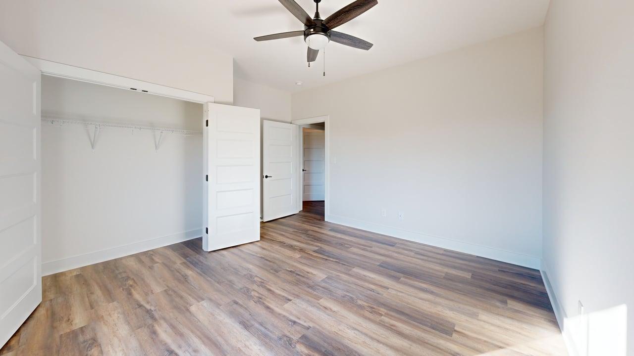 1868 Skinnell Mill Road Bedford, VA 24523 - Photo 8 of 24 a view of a room with wooden floor and white walls