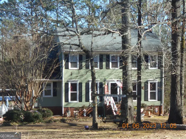 a front view of a building with street view