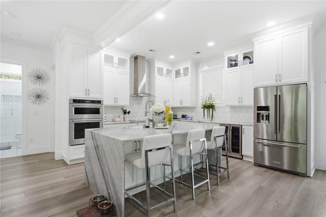 2585 Dr Johns Road Westminster, SC 29693 - Photo 11 of 40 This kitchen features a bright, modern design with an elegant island, perfect for culinary endeavors and casual dining.
