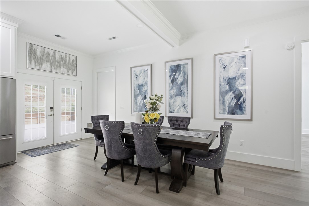 2585 Dr Johns Road Westminster, SC 29693 - Photo 14 of 40 This dining area features elegant flooring and easy access to outdoor spaces.