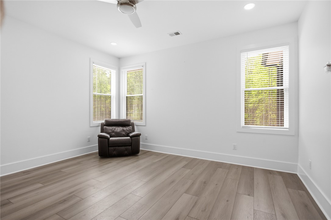 2585 Dr Johns Road Westminster, SC 29693 - Photo 16 of 40 This bright room features light flooring, ample natural light, and a clean, versatile design.