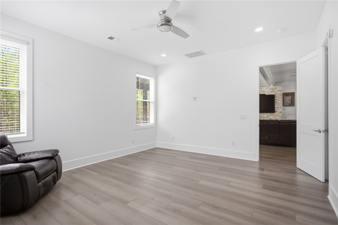 2585 Dr Johns Road Westminster, SC 29693 - Photo 17 of 40 This bright and airy room offers comfortable living with modern amenities and durable flooring.