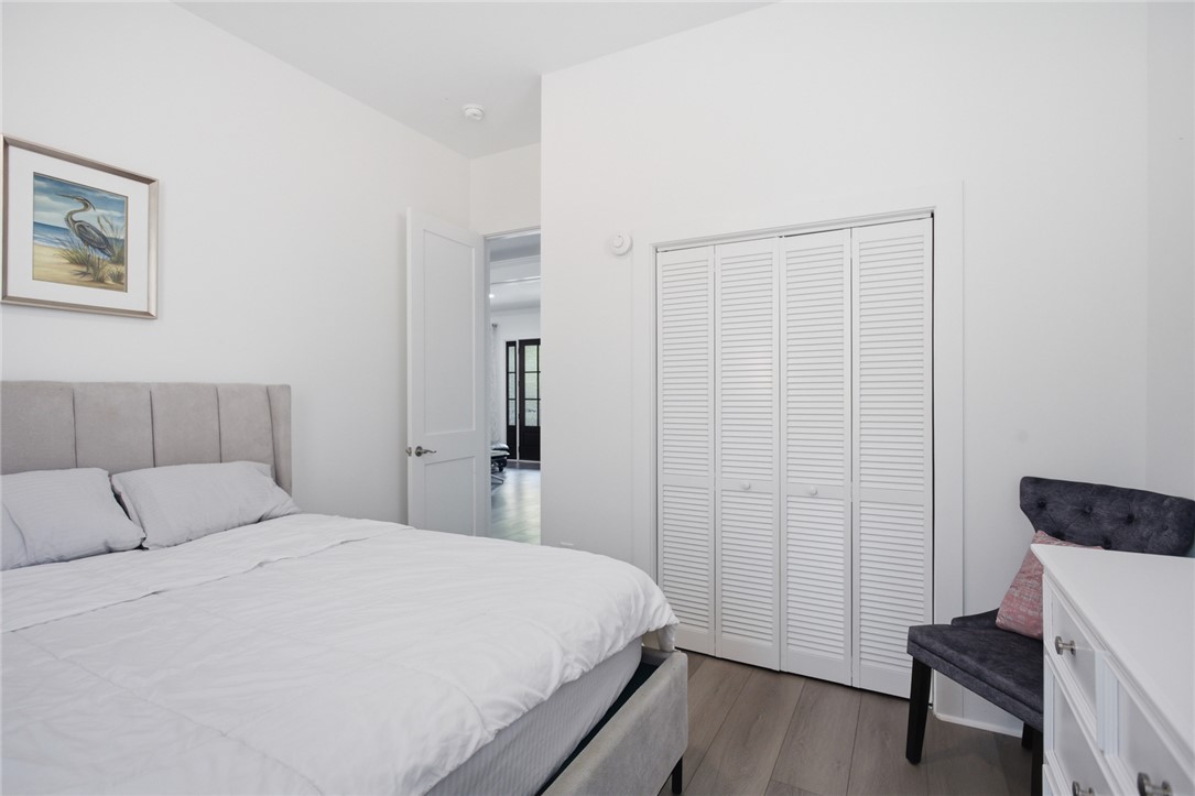 2585 Dr Johns Road Westminster, SC 29693 - Photo 25 of 40 This serene bedroom offers a tranquil retreat with ample closet space and hardwood-style flooring.