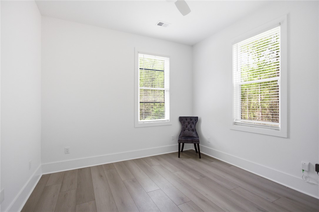 2585 Dr Johns Road Westminster, SC 29693 - Photo 26 of 40 Bright and airy room with large windows, offering a peaceful retreat.
