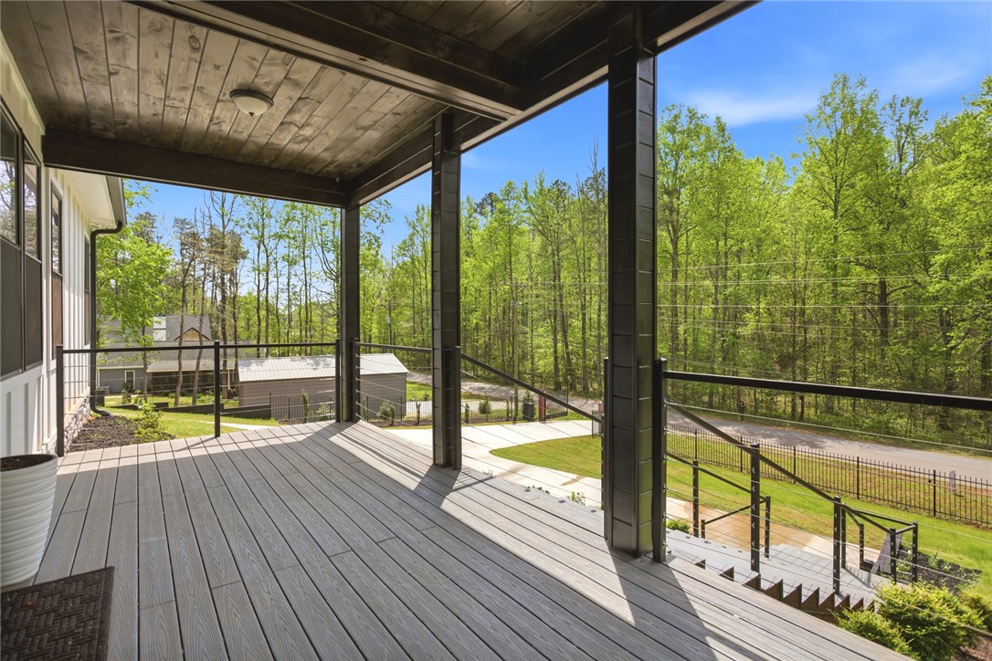 2585 Dr Johns Road Westminster, SC 29693 - Photo 3 of 40 Enjoy tranquil moments and serene views from this inviting covered porch.
