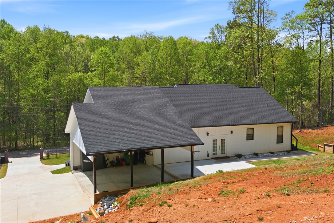 2585 Dr Johns Road Westminster, SC 29693 - Photo 32 of 40 This charming house offers serene living amidst lush, verdant landscapes.