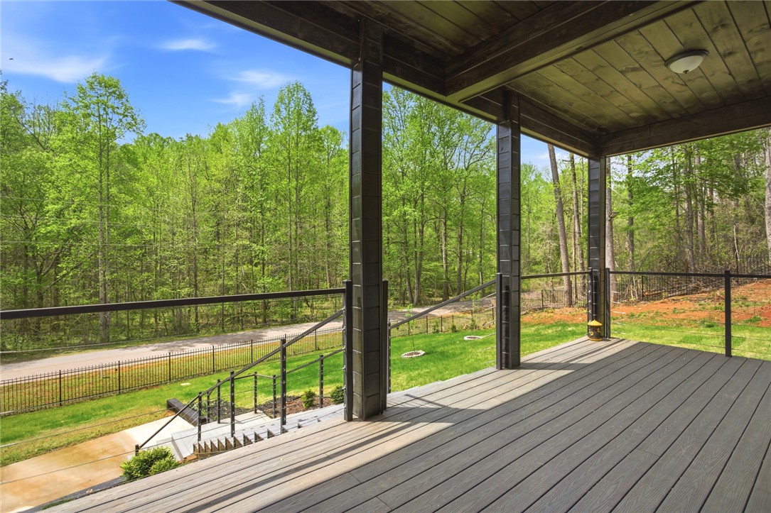 2585 Dr Johns Road Westminster, SC 29693 - Photo 5 of 40 This outdoor space offers tranquil views of lush trees, perfect for quiet enjoyment.