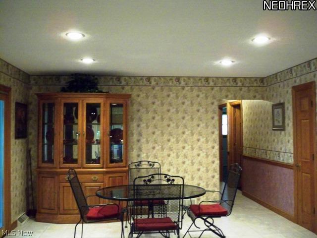 Dining Room open to the kitchen and doors to the 3 season room