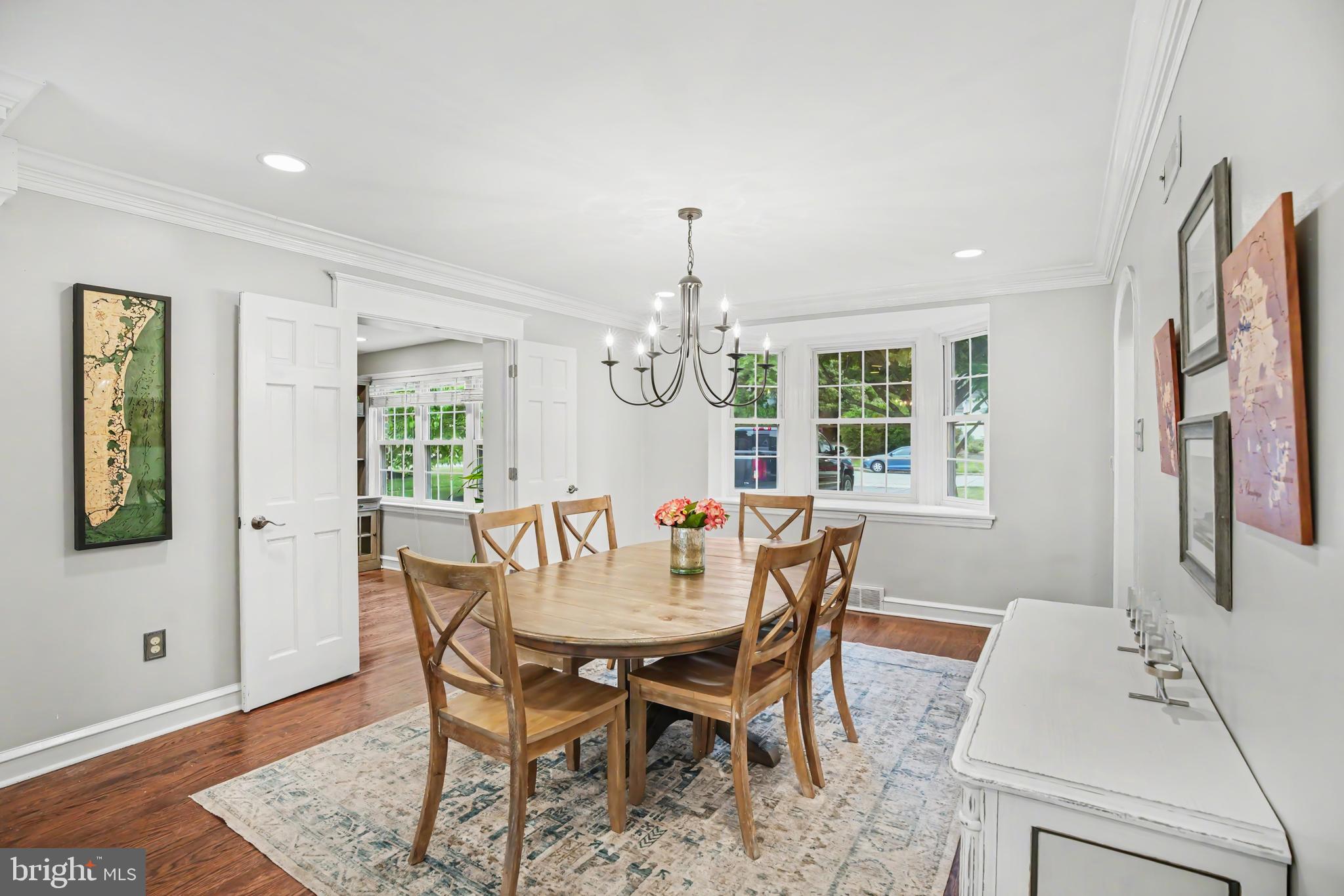 235 Hopkins Road Haddonfield, NJ 08033 - Photo 5 of 47 a view of a dining room with furniture window and wooden floor
