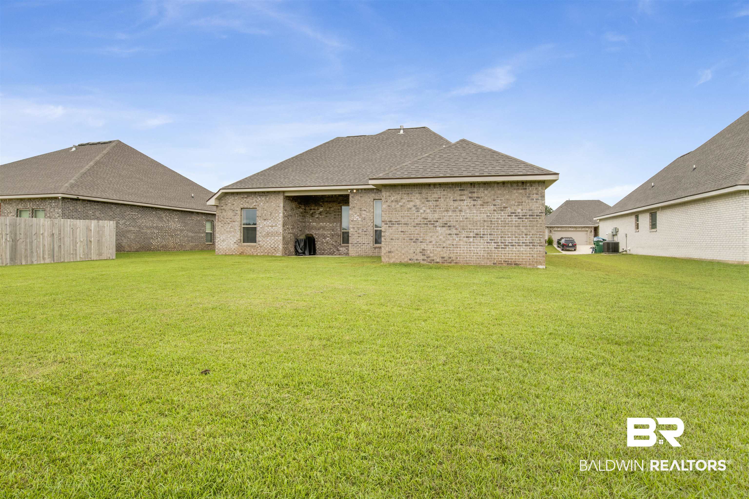 30770 Marcel Boulevard Spanish Fort, AL 36527 - Photo 23 of 23 Back of house with a yard