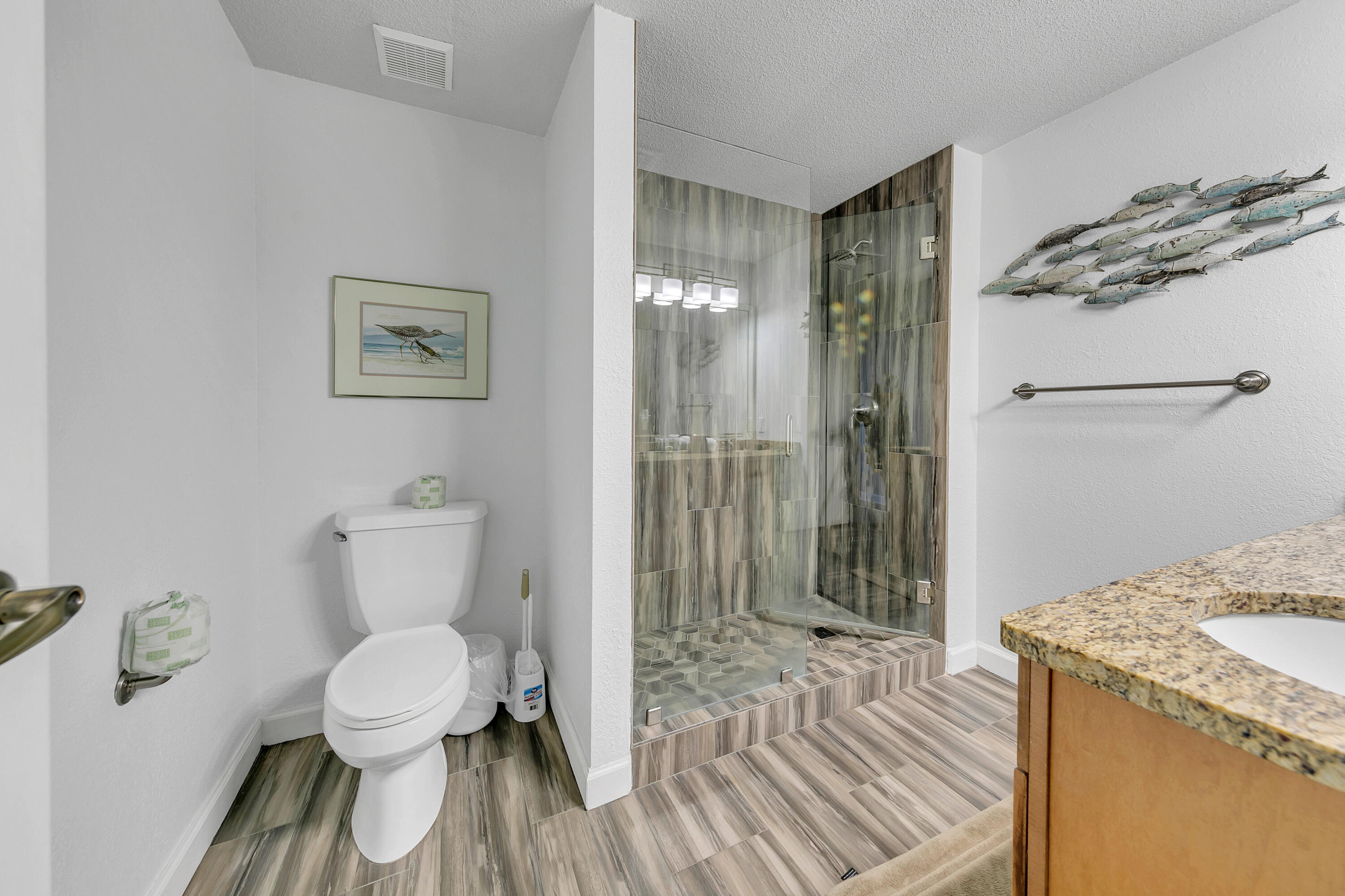 515 Tops'l Beach Boulevard, Unit 913 Miramar Beach, FL 32550 - Photo 14 of 34 a bathroom with a toilet and a shower