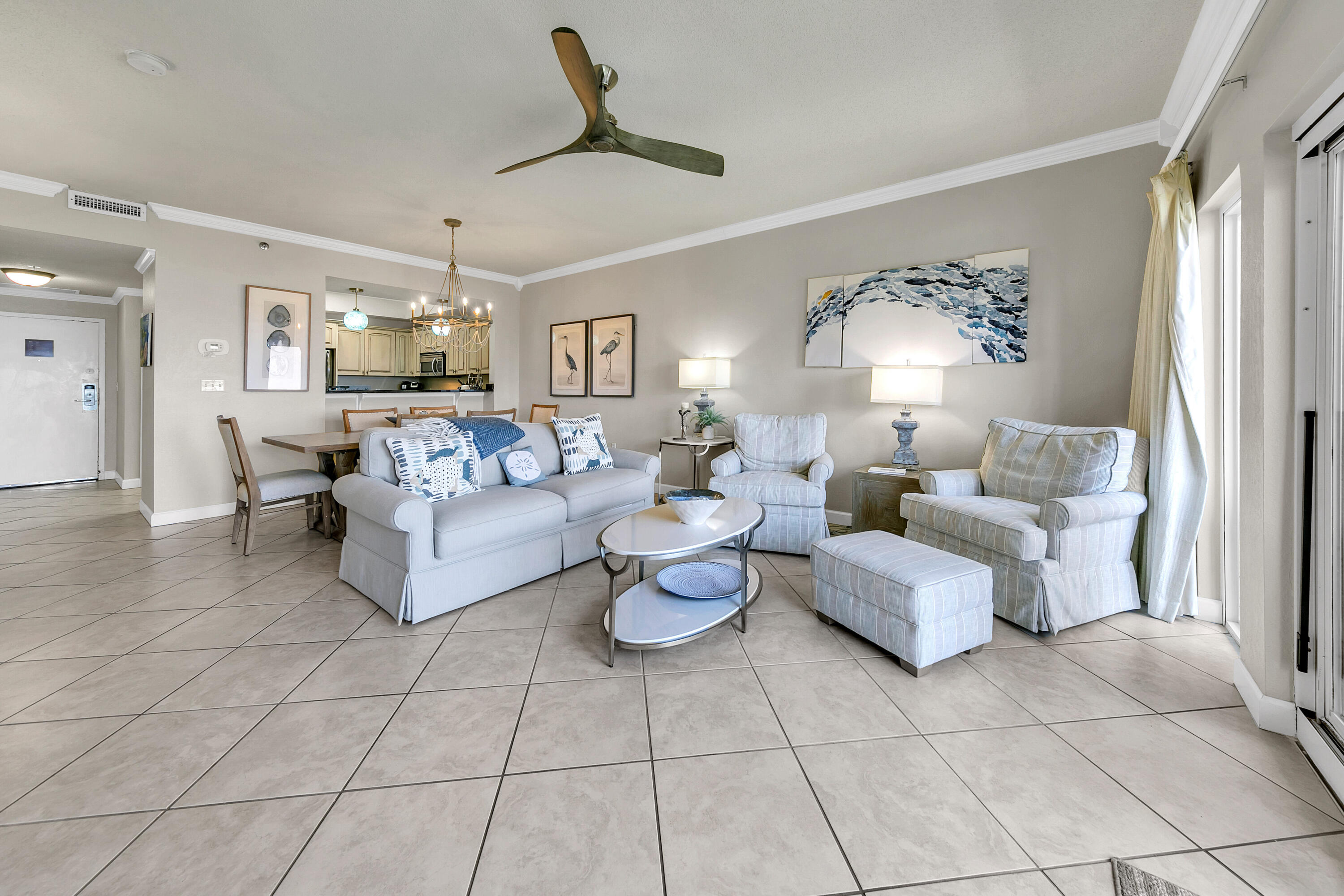 515 Tops'l Beach Boulevard, Unit 913 Miramar Beach, FL 32550 - Photo 2 of 34 a living room with furniture and a chandelier