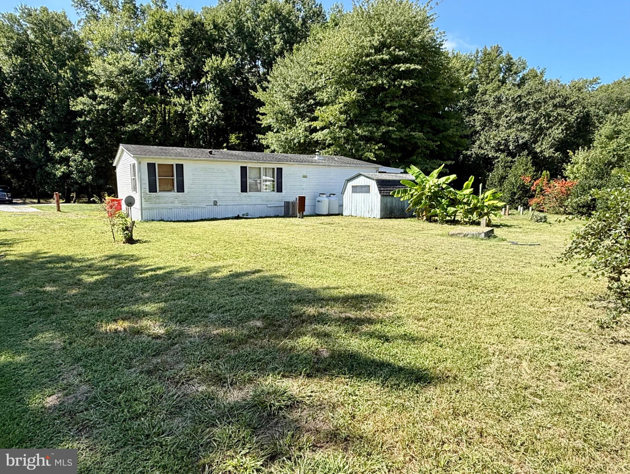 57 Torbert Road Milford, DE 19963 - Photo 5 of 21 Back yard view of double wide