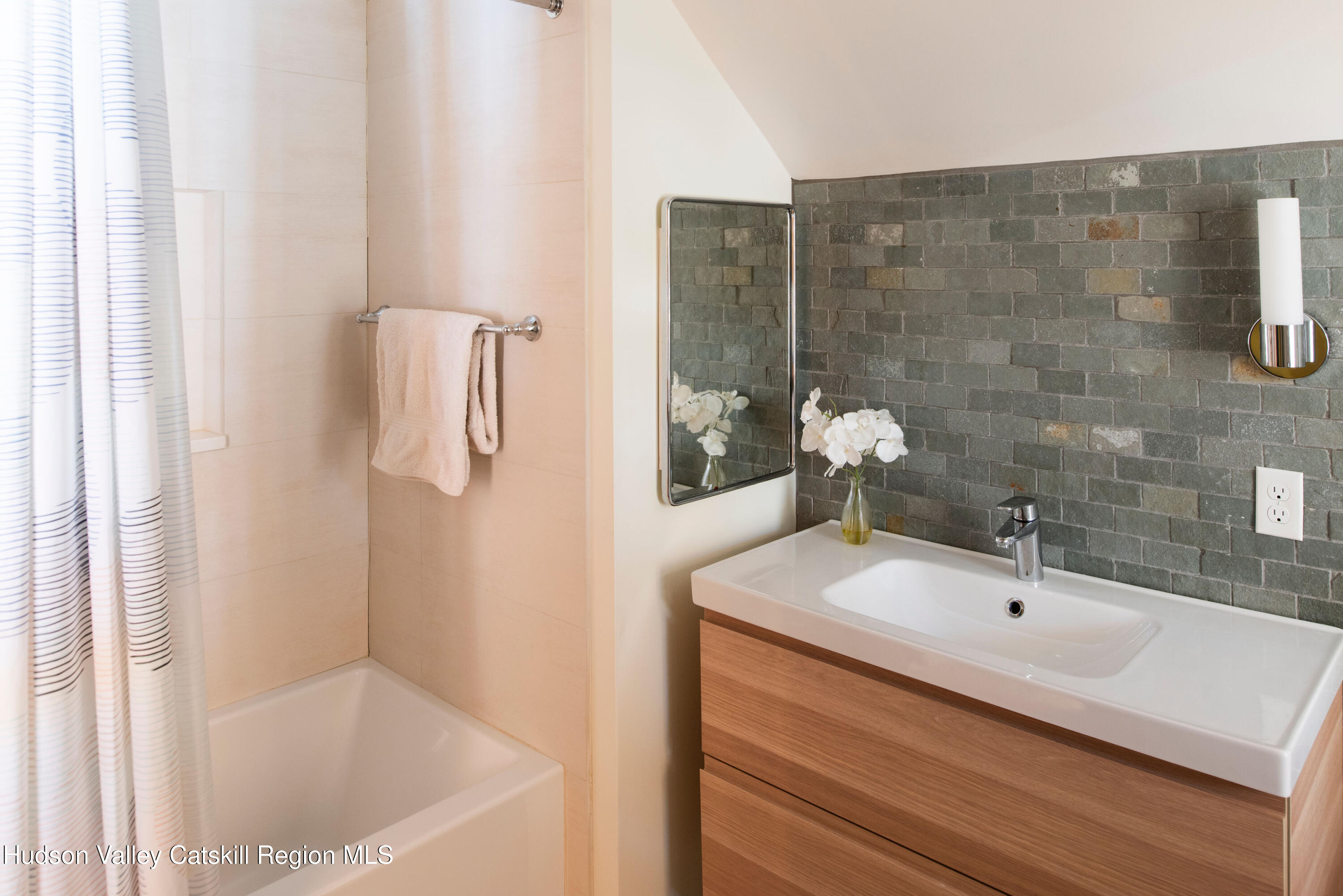 195 Vlei Road Rhinebeck, NY 12572 - Photo 18 of 24 a bathroom with a sink and mirror