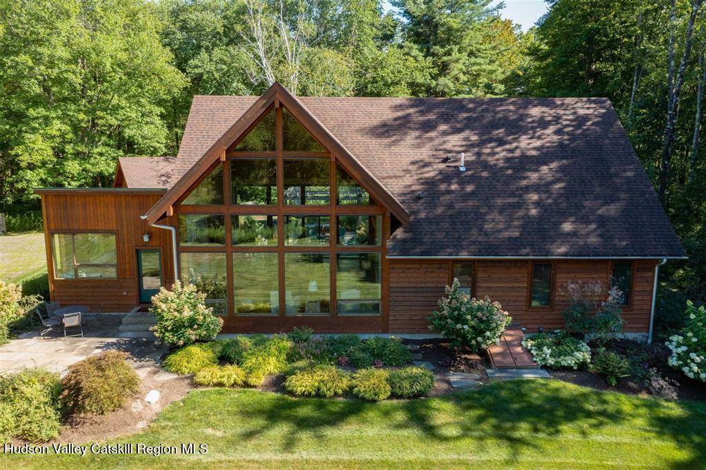 195 Vlei Road Rhinebeck, NY 12572 - Photo 23 of 24 a front view of a house with a yard