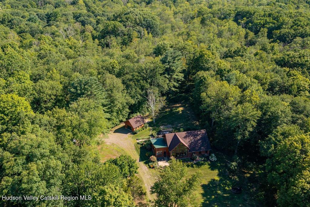 195 Vlei Road Rhinebeck, NY 12572 - Photo 24 of 24 a view of a lake with a house