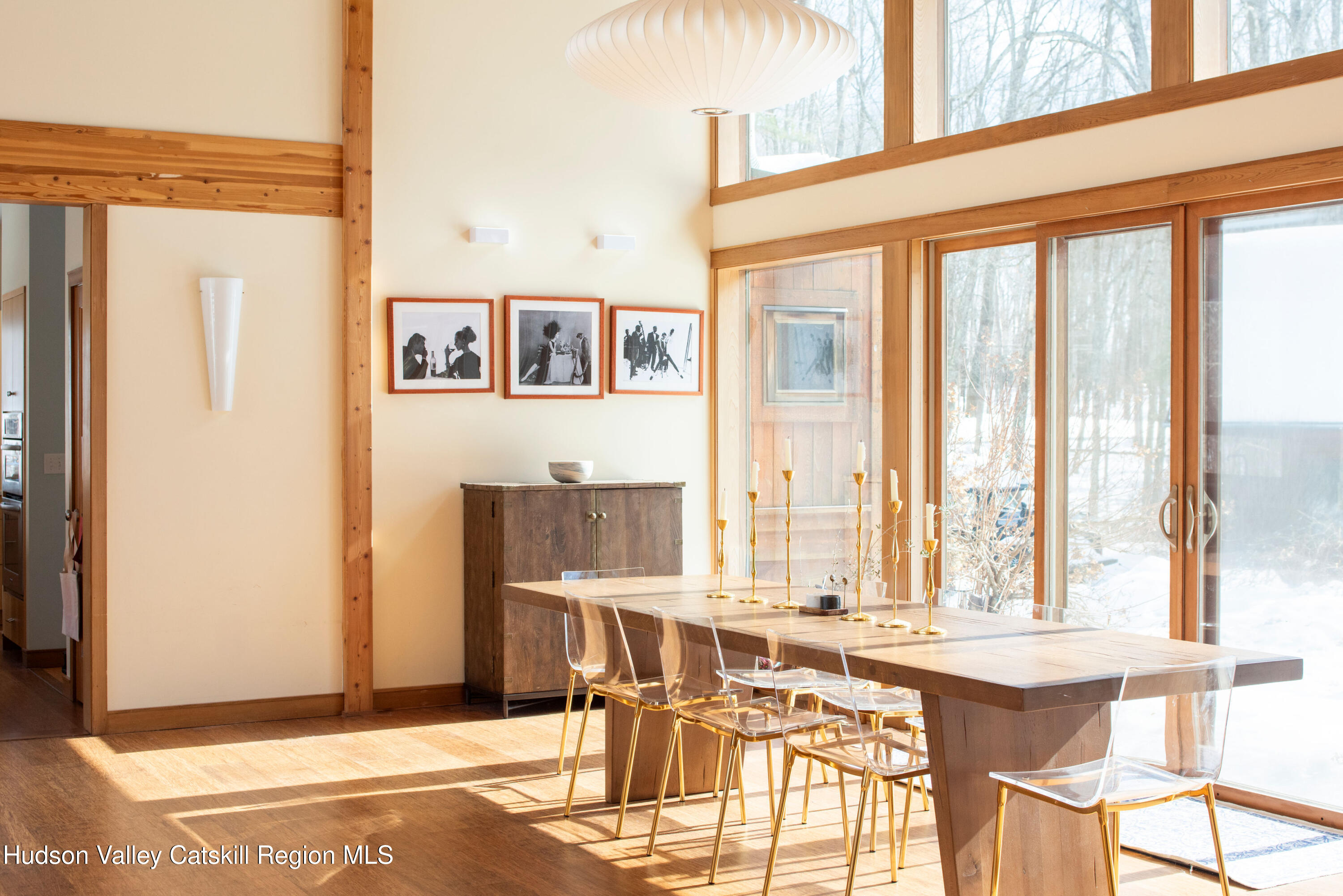 195 Vlei Road Rhinebeck, NY 12572 - Photo 4 of 24 a dining room with furniture and large window
