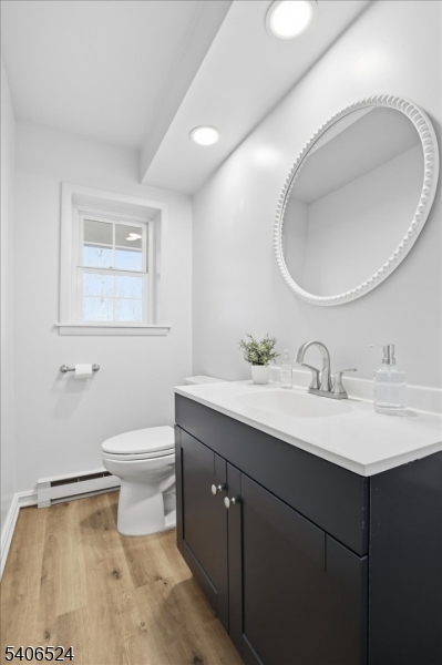 309 North Road Chester, NJ 07930 - Photo 14 of 37 a bathroom with a toilet sink and mirror