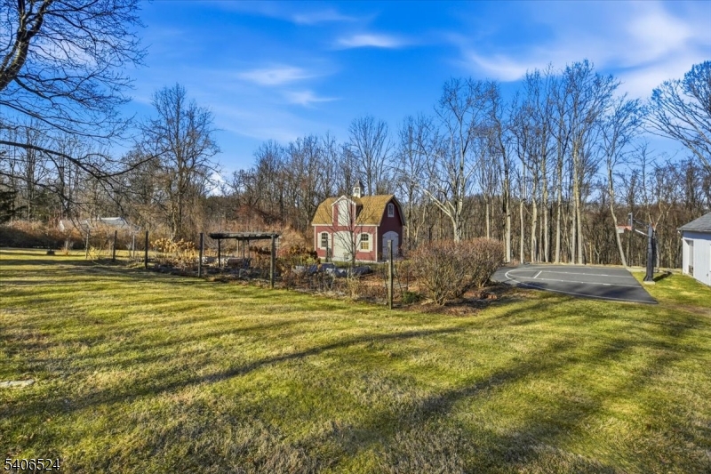 309 North Road Chester, NJ 07930 - Photo 30 of 37 a view of a playground with a house