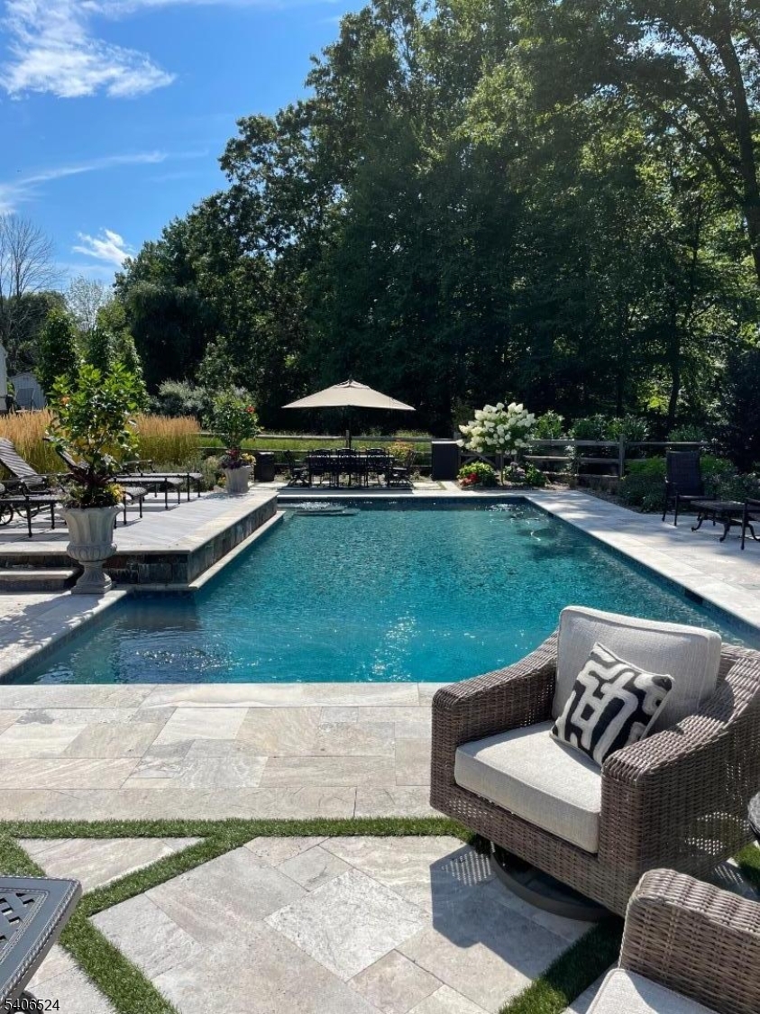 309 North Road Chester, NJ 07930 - Photo 5 of 37 a view of a patio with couches and a fire pit