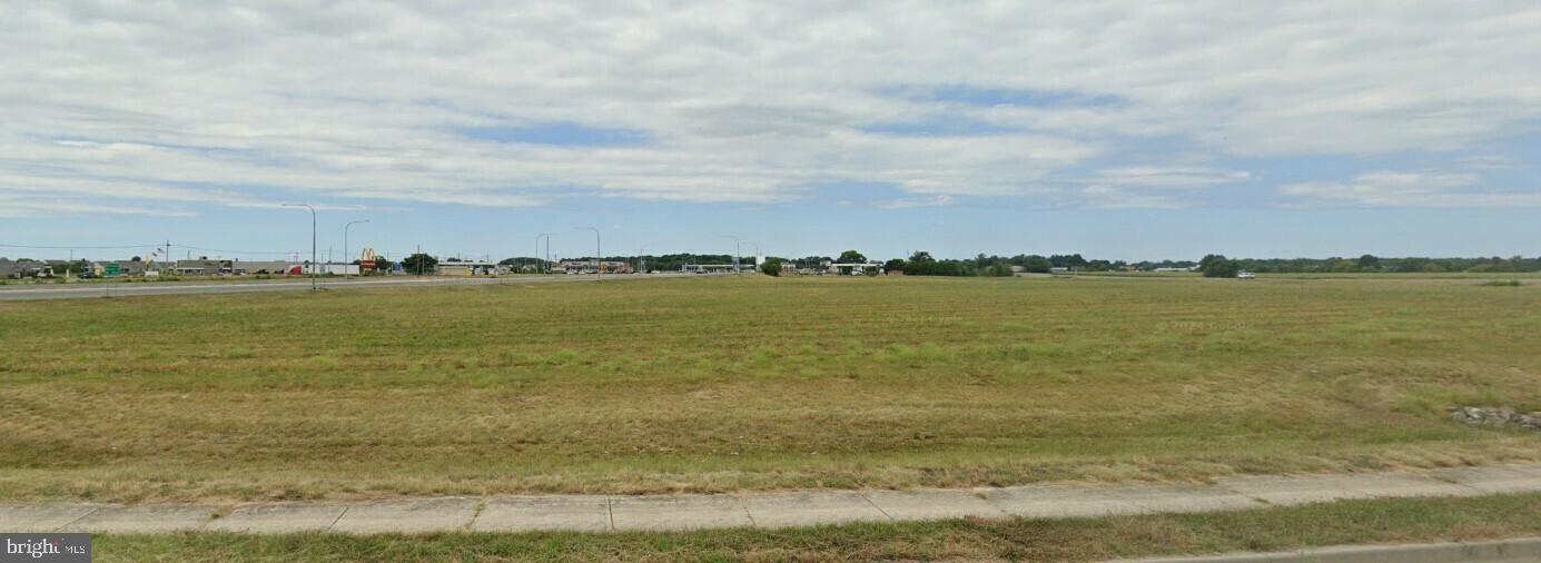 404 Tatman Farm Road Bridgeville, DE 19933 - Photo 6 of 13 a view of a lake with houses in the back