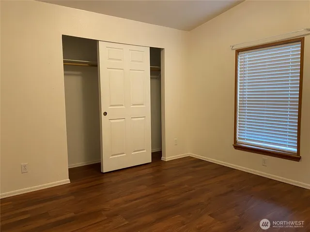 a bathroom with a tub and shower