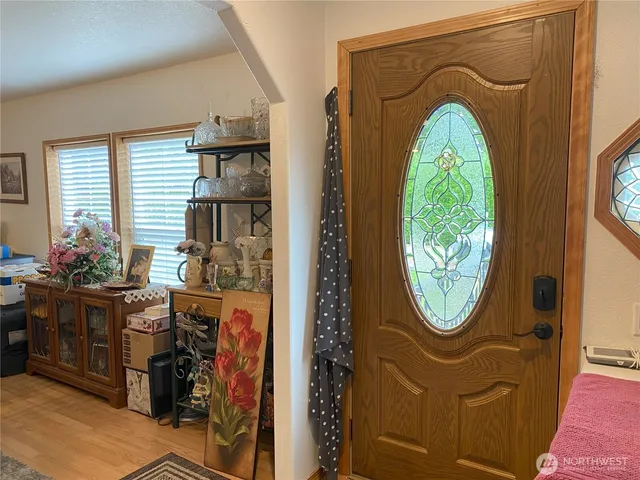 a view of swimming pool with seating space