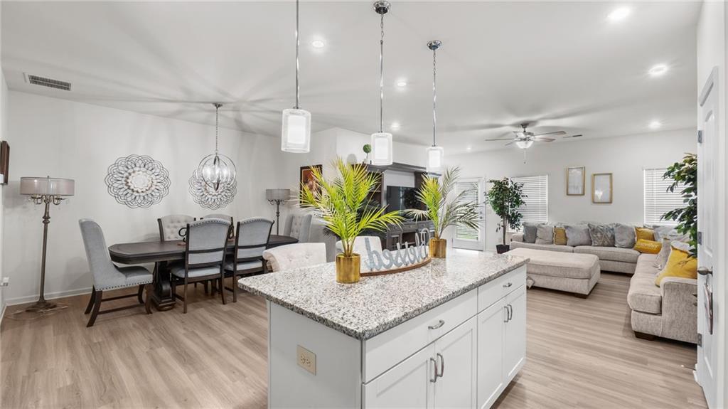 3 Joplin Street Northeast Rome, GA 30161 - Photo 5 of 26 a kitchen with a table and chairs in it
