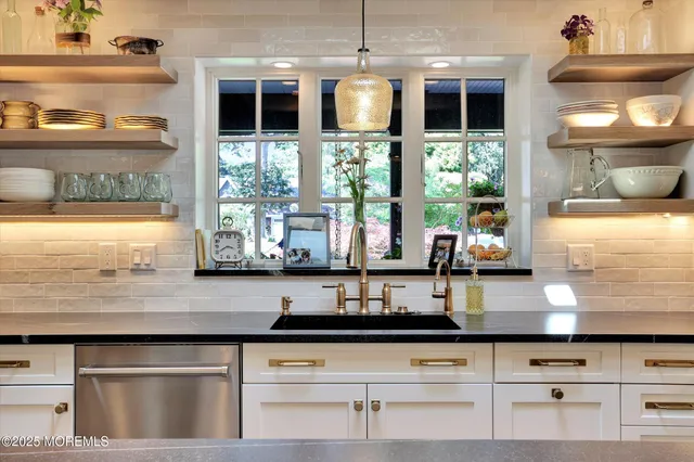 a bedroom with a bed and a fireplace